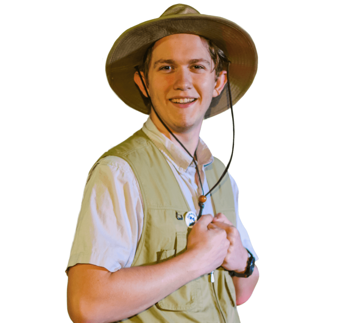 Worldcrafters Team Member-A brown-haired man wearing an apricot hat